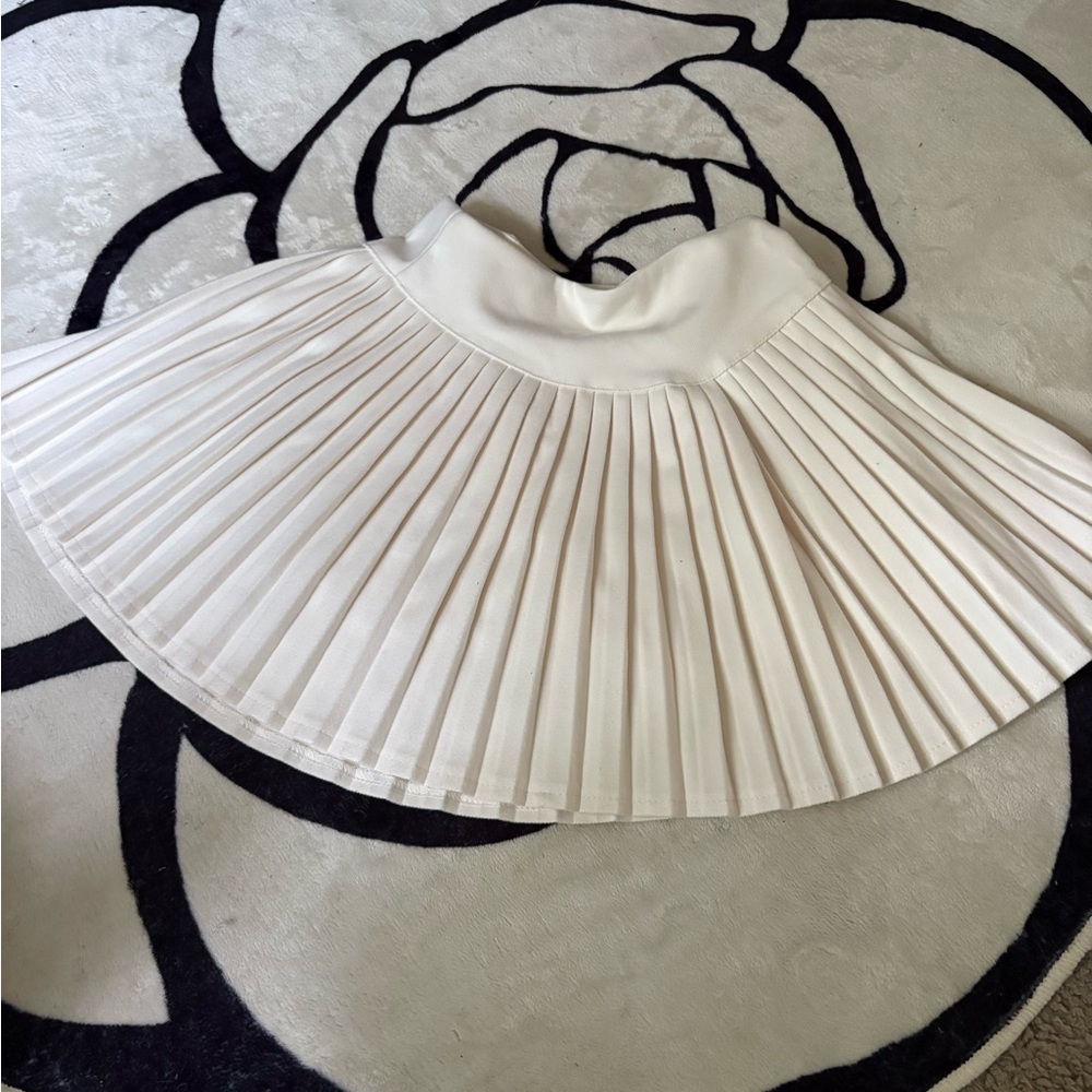 White pleated skirt